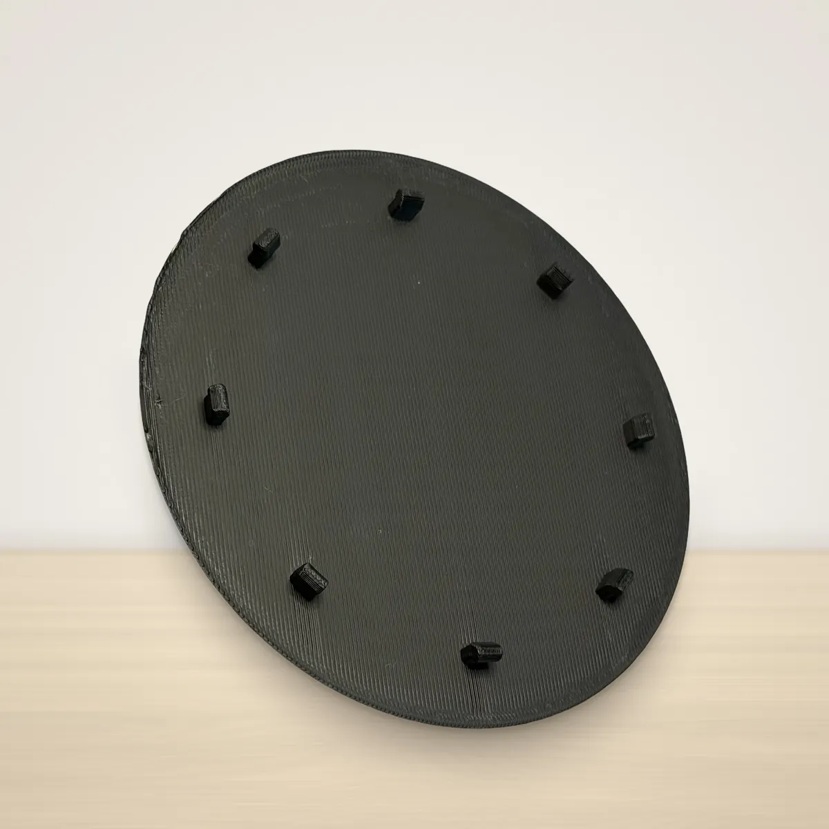 Round inspection cover, angled view showing the snap-in tabs